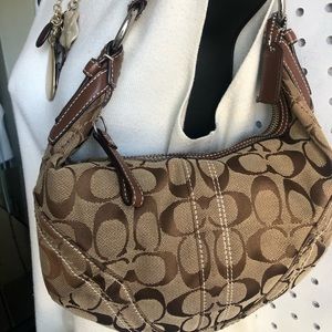 Small brown coach clutch bag